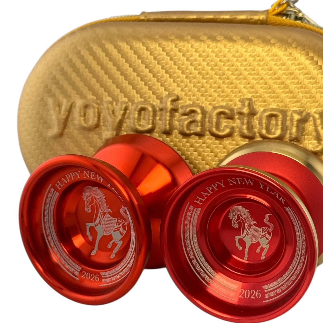 Red yoyos with 'Happy New Year' and horse design on a gold 'Yoyofactory' case.