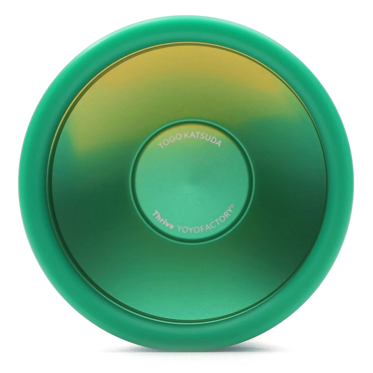 A green yo-yo with a gradient finish transitioning from yellow-green to deep green, featuring the 'YOGO KATSUDA' and 'Thrive YOYOFACTORY' branding on the center hub, set against a plain white background.